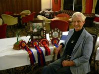 Mary Korn with her collection of trophies