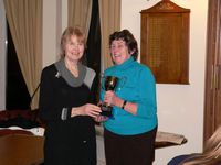 Sydney Byrd with the award for Dunbar George accumulating 12000km/7500 miles